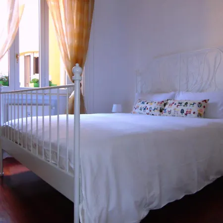 The Bedroom In Проживание в семье Милан